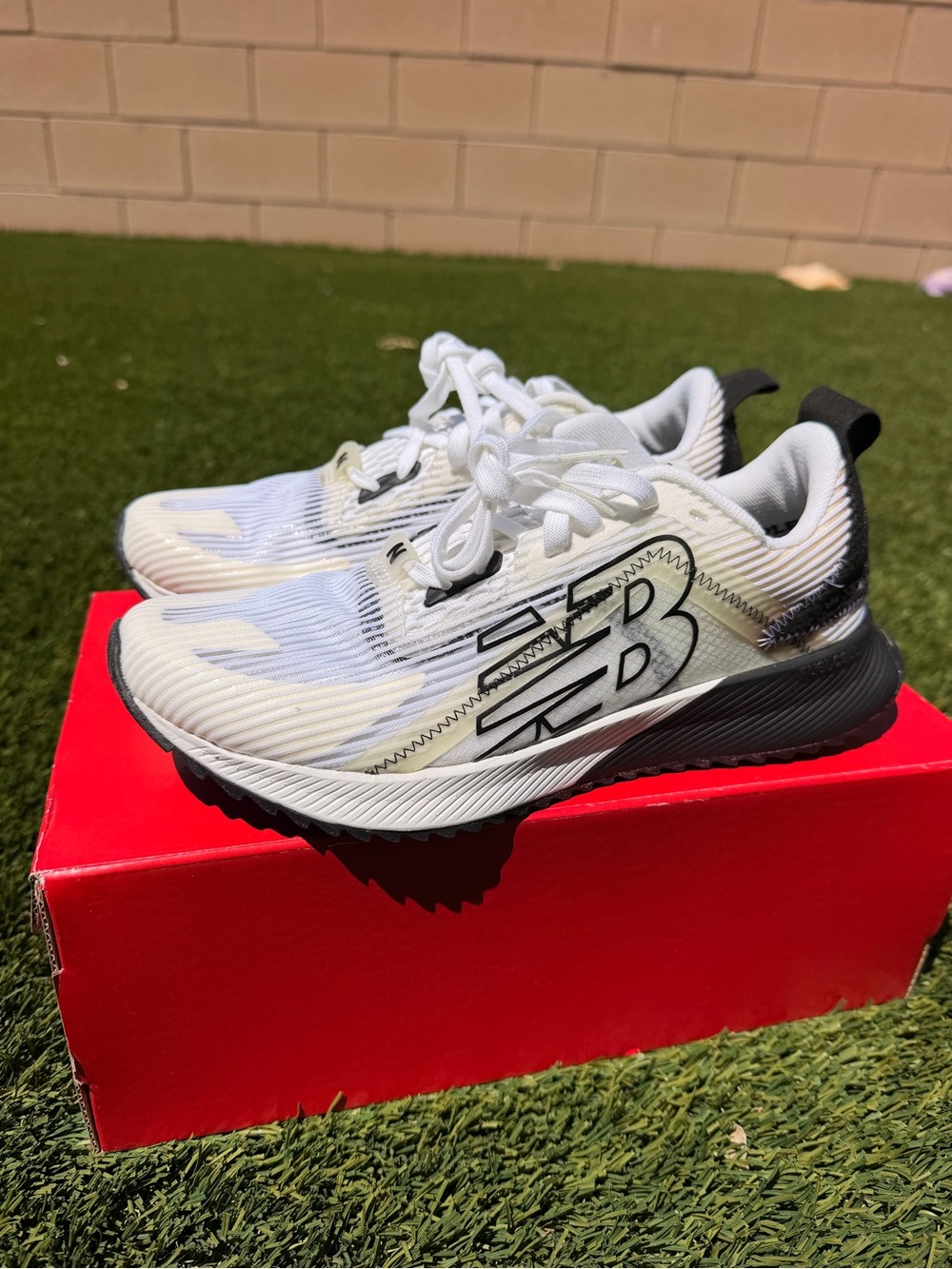 New Balance SAMPLE SIZE White and Black Running Shoes